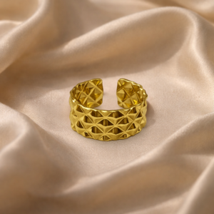 Studio-style image showcasing Heer ring against a neutral, elegant backdrop