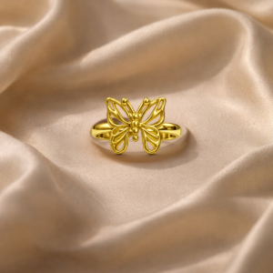 Studio-style image showcasing Pankh ring against a neutral, elegant backdrop